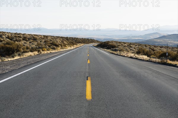 USA, California, Eastern Sierras, Route 88, Sky over empty road