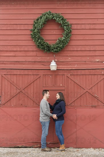 Couple below wreath