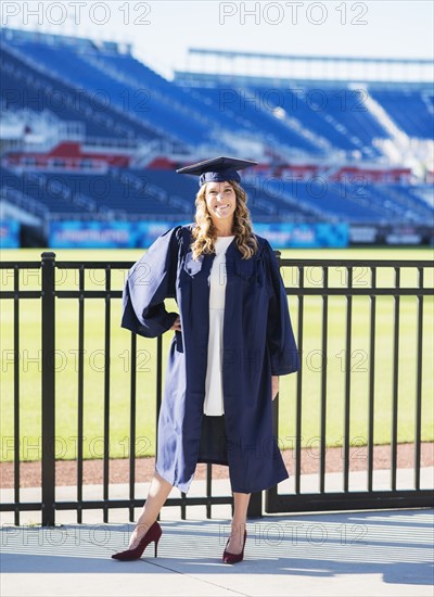 Portrait of graduate student in stadium