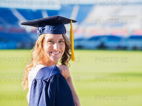 Portrait of graduate student in stadium