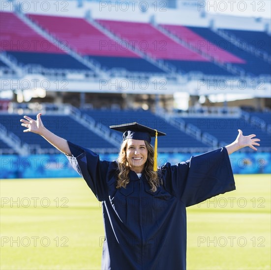 Portrait of graduate student in stadium