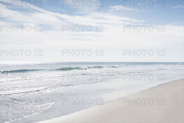 Sky above sea and sandy beach