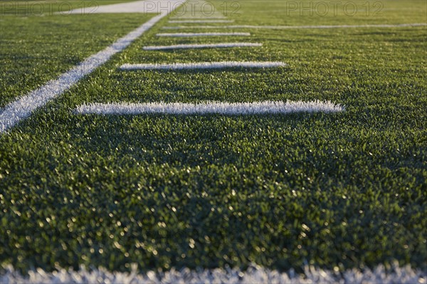 Marking lines on green playing field