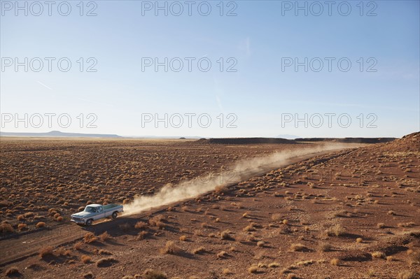 USA, Arizona, Pick up truck going through desert on Route 66