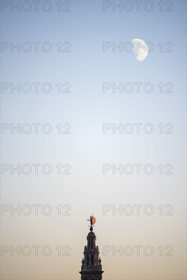 Spain, Andalusia, Seville, Moonrise over Giralda Tower