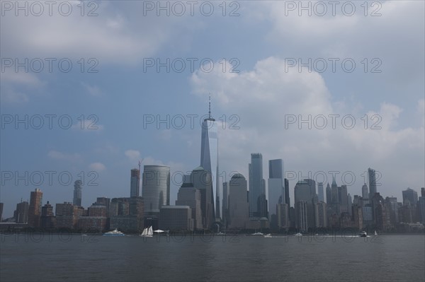 USA, New York State, New York City, Manhattan skyline in sunlight