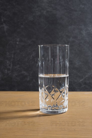 Half full glass on table