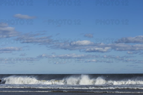 Waves splashing onto beach