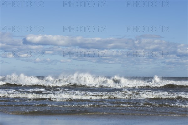Waves splashing onto beach