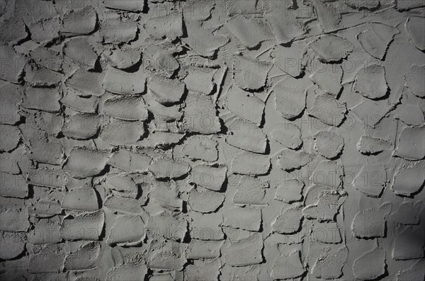 Textured grey cement wall