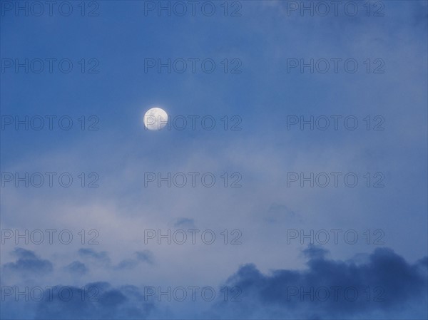 Moon in blue sky