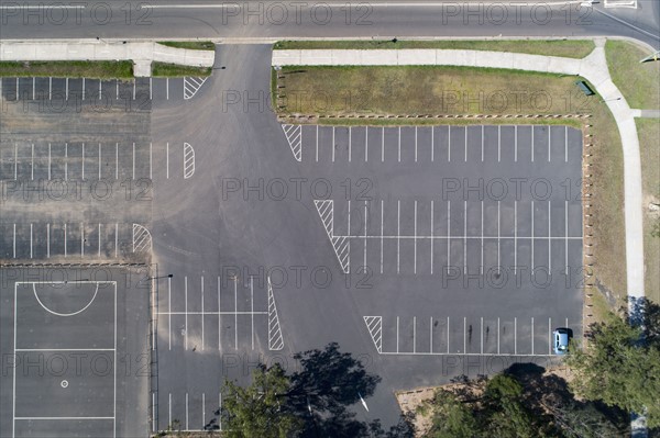 Parking lot next to playing field