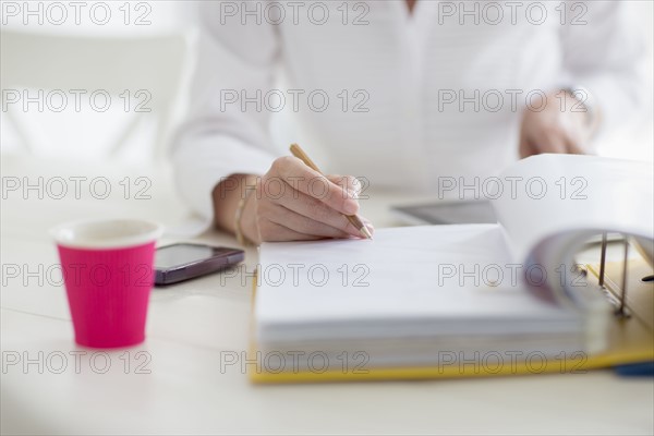 Woman filling documents