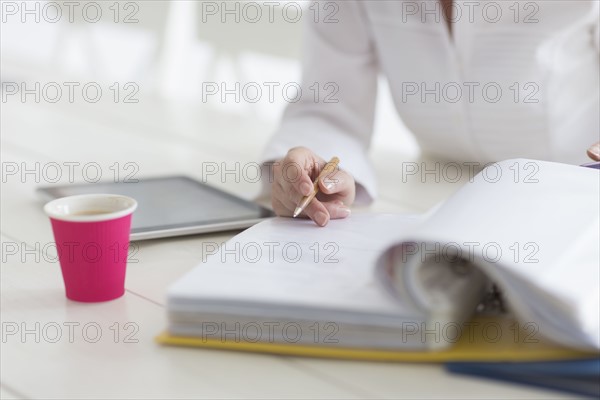 Woman filling documents