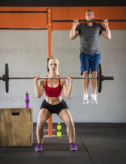 Man and woman working out