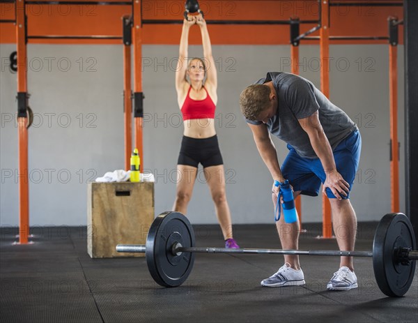 Man and woman working out