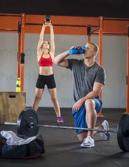 Man and woman working out