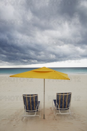 Chairs and umbrella on beach