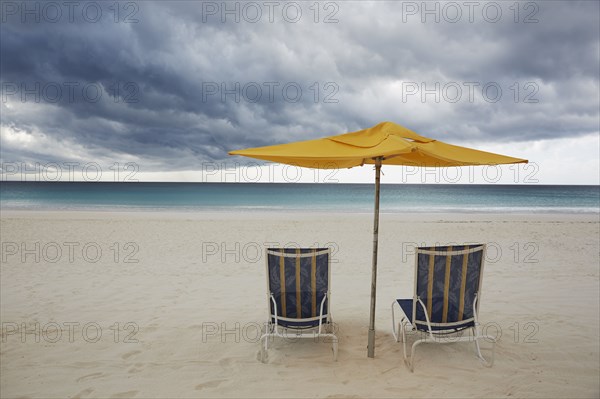 Chairs and umbrella on beach