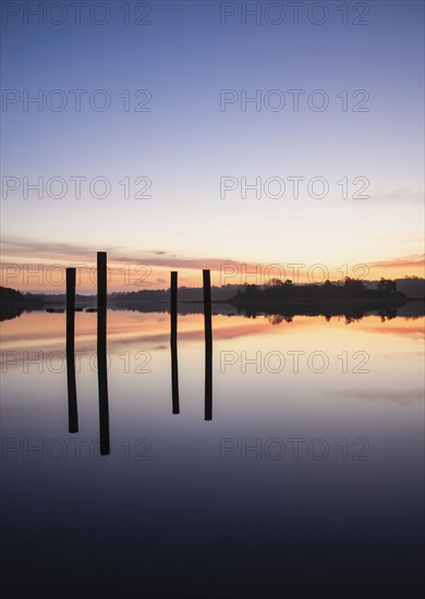 Posts in sea at sunrise