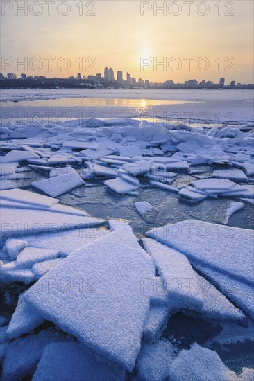 Ice on river at sunset