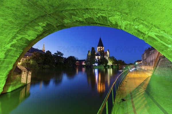 Temple Neuf and illuminated bridge in Metz, France