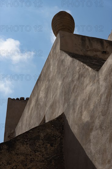 Low angle view of finial on roof in Monemvasia, Greece