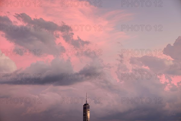 Freedom Tower against sky at sunset in New York City, USA