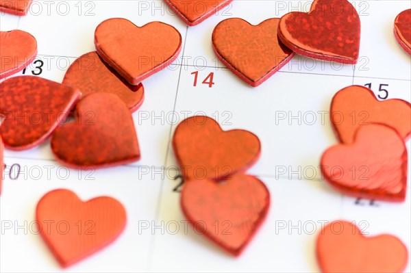 Red hearts on Valentine's Day box on calendar