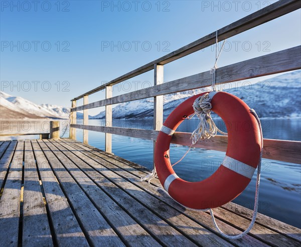 Life preserver on pier in Tromso, Norway