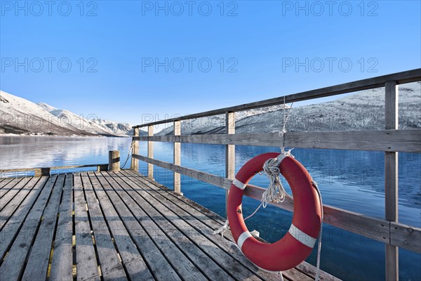 Life preserver on pier in Tromso, Norway