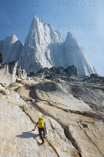 Man mountain climbing in Bugaboo Provincial Park, British Columbia, Canada