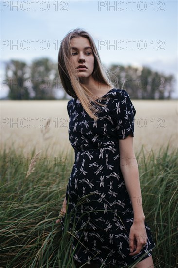 Young woman in field