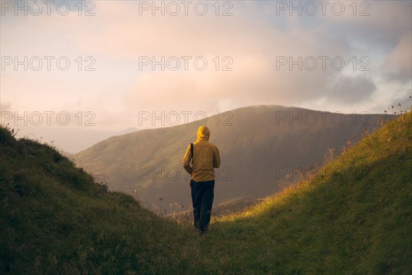 Rear view of man hiking in the Carpathian Mountain Range