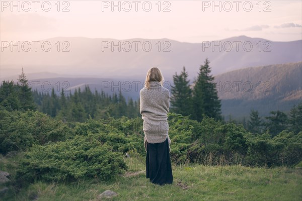 Woman wrapped in blanket in the Carpathian Mountain Range