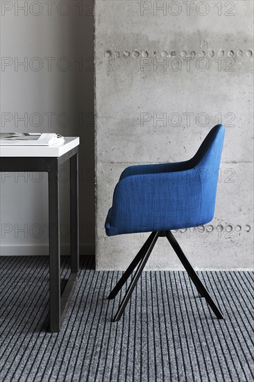 Blue chair by desk