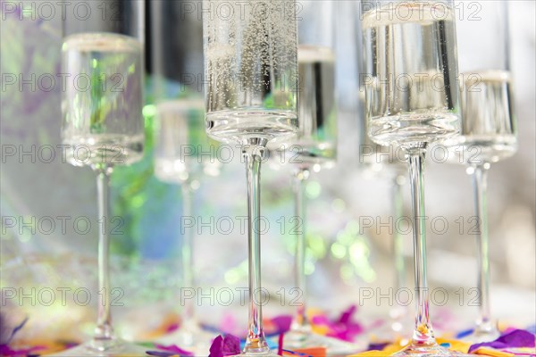 Champagne glasses with confetti