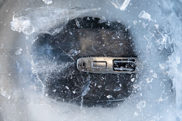 Computer mouse in ice