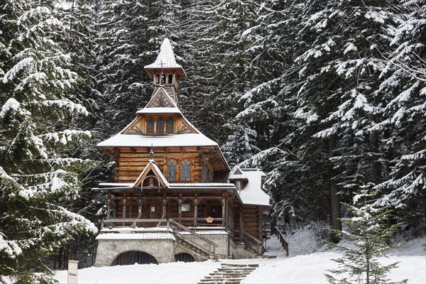 Chapel of the Sacred Heart of Jesus in snow in Jaszczurowka, Poland