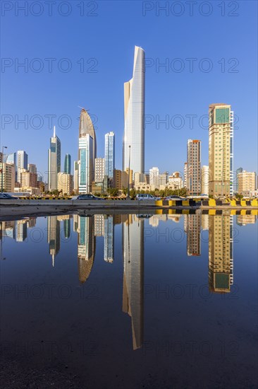 Skyline reflected in sea in Kuwait City, Kuwait