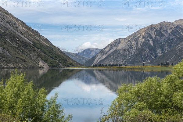 Lake Pearson below mountains in Canterbury, New Zealand