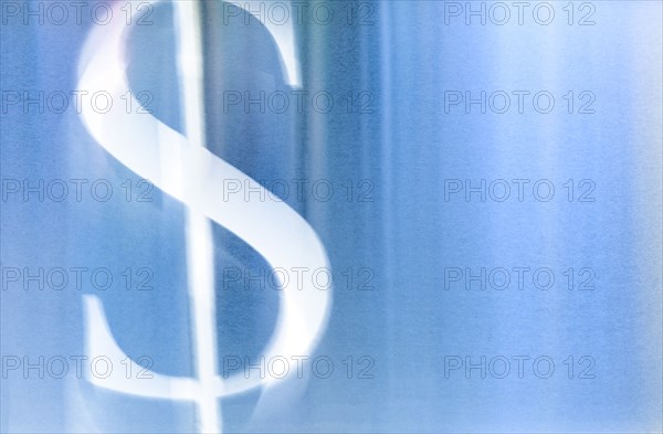 Illustration of white dollar sign against blue background