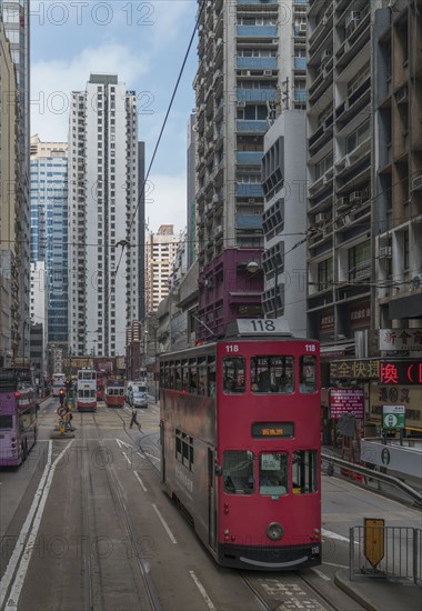 Double-decker tram on street in Hong Kong, China