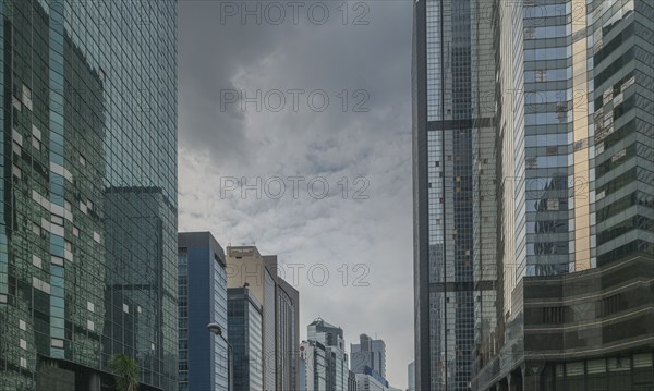 Modern office buildings on street in Hong Kong, China