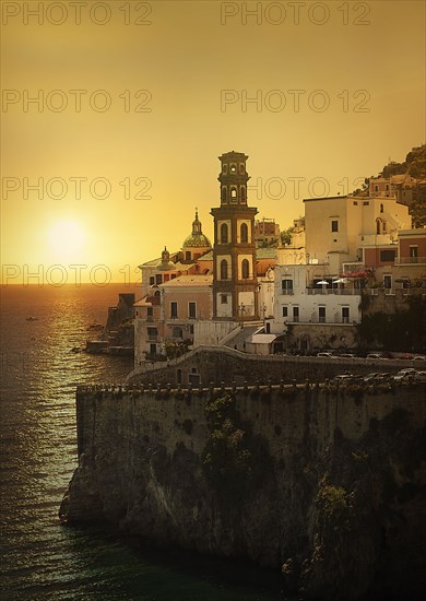 Bell tower by sea at sunset in Atrani, Italy