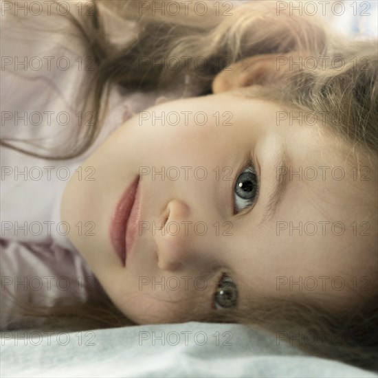 Portrait of girl lying down