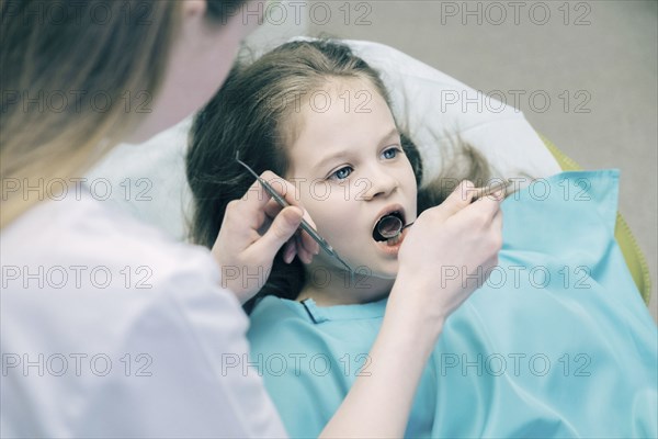 Girl during dentist examination