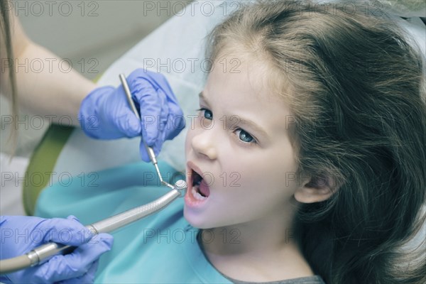 Girl during dentist examination