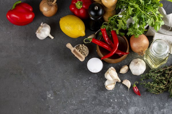 Raw vegetable ingredients with chili peppers