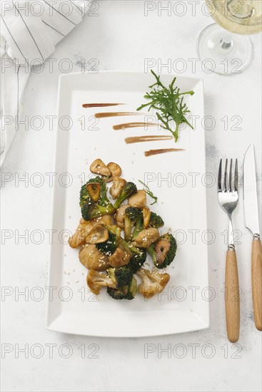 Plate of fried broccoli and cauliflower